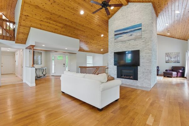 Fireplace, Interior, Living room, Recessed Lighting, Stone Walls, Wooden Ceilings, Wood Texture Flooring