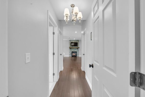 Chandelier, Fireplace, Interior, Recessed Lighting, Wood Texture Flooring