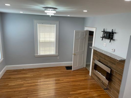 Empty room, Fireplace, Interior, Recessed Lighting, Wood Texture Flooring