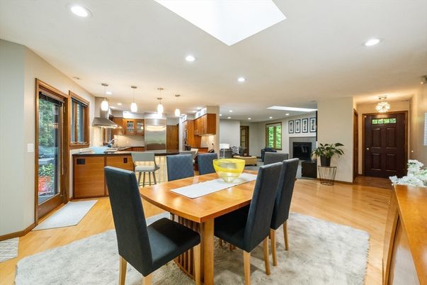Dining room, Fireplace, Interior, Kitchen, Pendant Lights, Recessed Lighting, Stainless Steel Appliances, Wood Texture Flooring