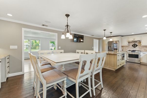 Dining room, Interior, Kitchen, Pendant Lights, Recessed Lighting, Stainless Steel Appliances, Wood Texture Flooring