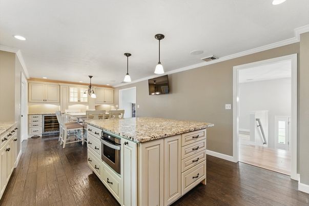 Dining room, Interior, Kitchen, Pendant Lights, Recessed Lighting, Stainless Steel Appliances, Wood Texture Flooring