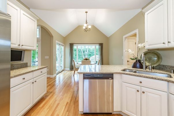 Chandelier, Dining room, Interior, Kitchen, Pendant Lights, Stainless Steel Appliances, Wood Texture Flooring