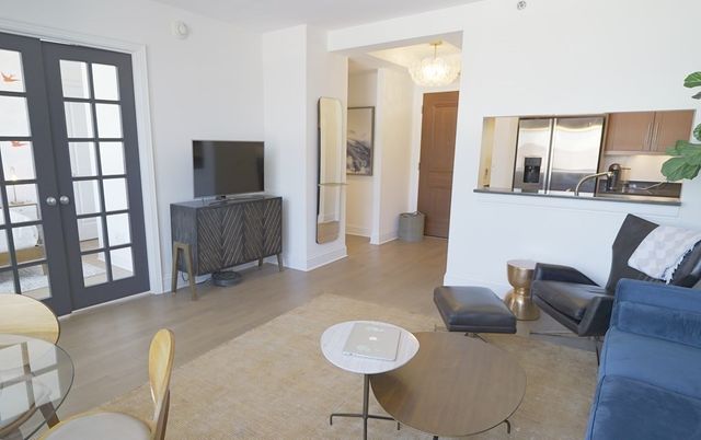 Chandelier, Dining room, Interior, Kitchen, Living room, Stainless Steel Appliances, Wood Texture Flooring