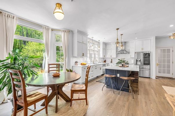 Dining room, Interior, Kitchen, Pendant Lights, Recessed Lighting, Stainless Steel Appliances, Wood Texture Flooring