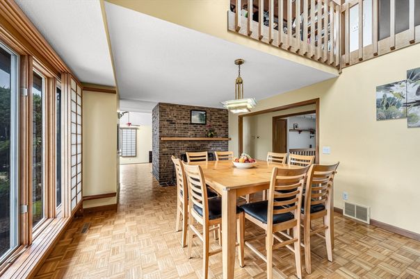 Dining room, Fireplace, Interior, Pendant Lights, Stone Walls, Wood Texture Flooring