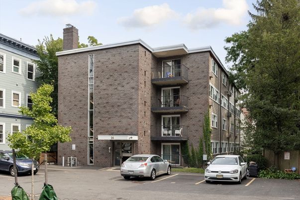 Exterior, Facade, Brick Facade, Condo Building