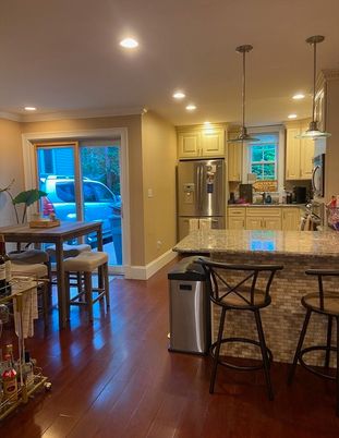 Dining room, Interior, Kitchen, Pendant Lights, Recessed Lighting, Stainless Steel Appliances, Wood Texture Flooring