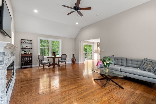 Dining room, Fireplace, Interior, Living room, Recessed Lighting, Wood Texture Flooring