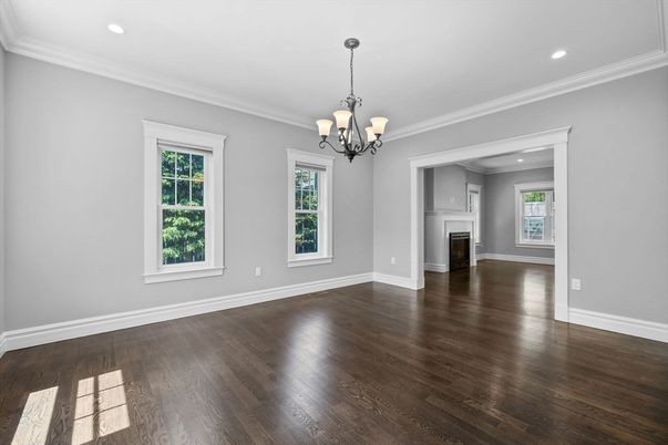 Chandelier, Empty room, Fireplace, Interior, Recessed Lighting, Wood Texture Flooring