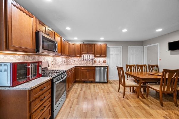 Dining room, Interior, Kitchen, Recessed Lighting, Stainless Steel Appliances, Wood Texture Flooring