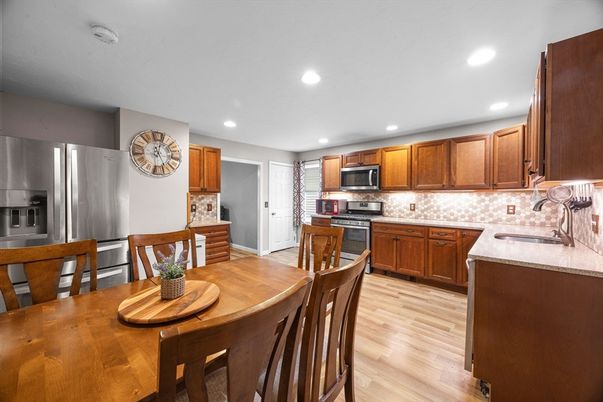 Dining room, Interior, Kitchen, Recessed Lighting, Stainless Steel Appliances, Wood Texture Flooring