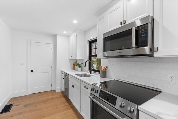 Interior, Kitchen, Recessed Lighting, Stainless Steel Appliances, Wood Texture Flooring