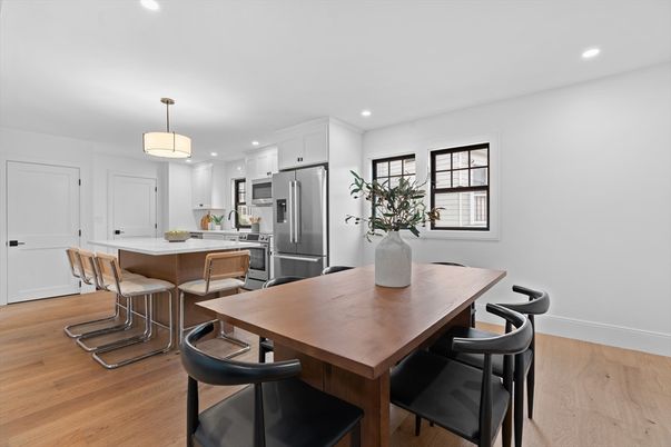 Dining room, Interior, Kitchen, Pendant Lights, Recessed Lighting, Stainless Steel Appliances, Wood Texture Flooring