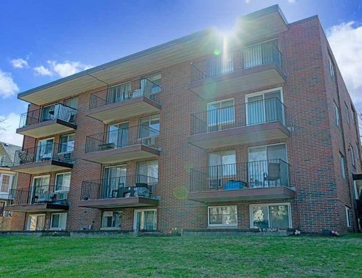 Exterior, Facade, Brick Facade, Condo Building