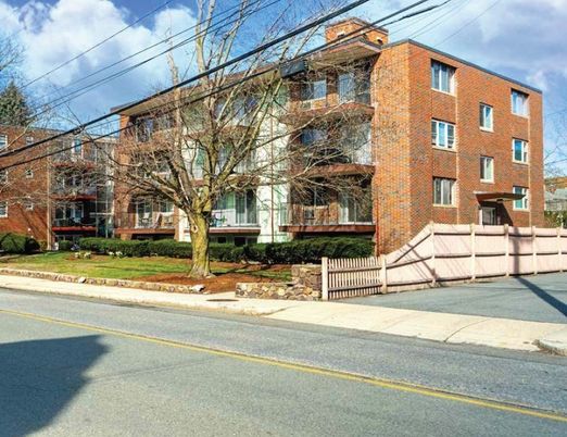 Exterior, Facade, Brick Facade, Condo Building