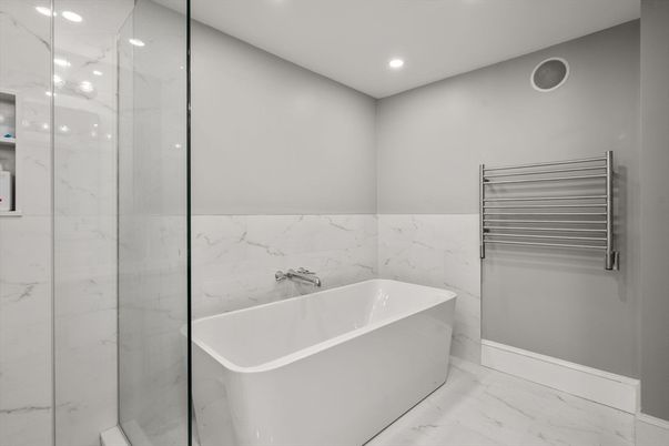 Bathroom, Free Standing Baths, Glass Shower, Interior, Marble, Marble Walls, Recessed Lighting