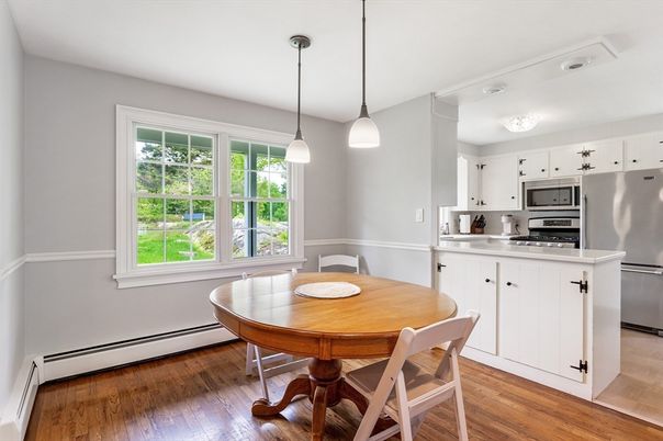 Dining room, Interior, Kitchen, Pendant Lights, Stainless Steel Appliances, Wood Texture Flooring