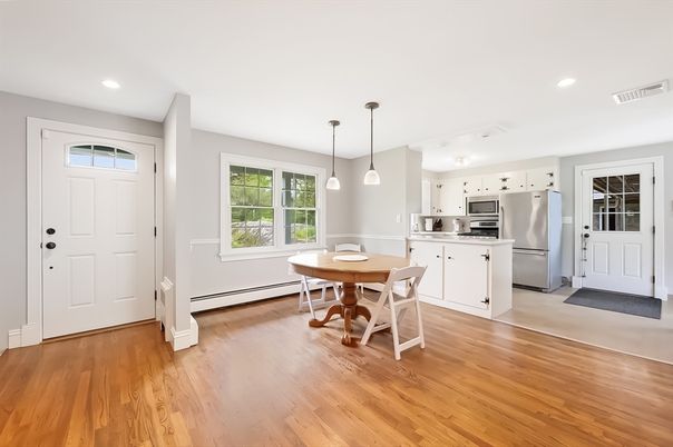 Dining room, Interior, Kitchen, Pendant Lights, Recessed Lighting, Stainless Steel Appliances, Wood Texture Flooring
