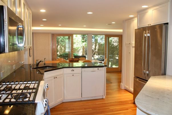 Dining room, Interior, Kitchen, Recessed Lighting, Stainless Steel Appliances, Wood Texture Flooring