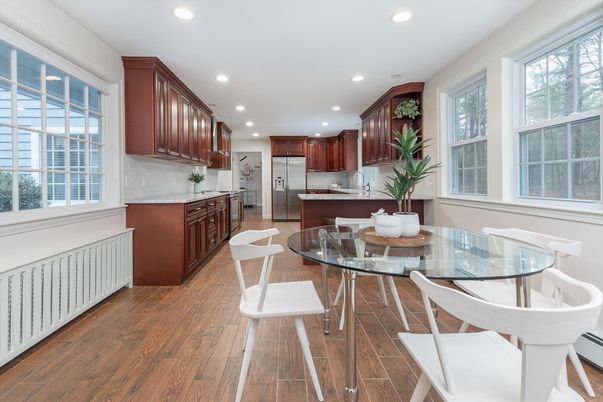 Dining room, Interior, Kitchen, Recessed Lighting, Stainless Steel Appliances, Wood Texture Flooring