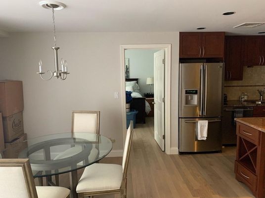 Chandelier, Dining room, Interior, Kitchen, Living room, Stainless Steel Appliances, Wood Texture Flooring