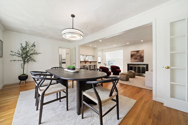 Dining room, Fireplace, Interior, Living room, Pendant Lights, Recessed Lighting, Wood Texture Flooring