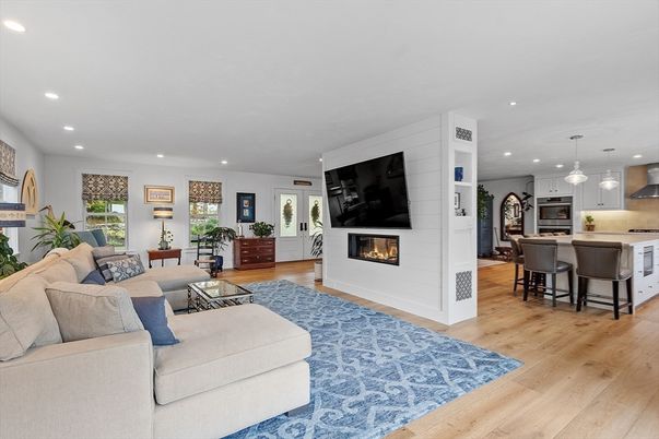 Dining room, Fireplace, Interior, Kitchen, Living room, Pendant Lights, Recessed Lighting, Stainless Steel Appliances, Wood Texture Flooring