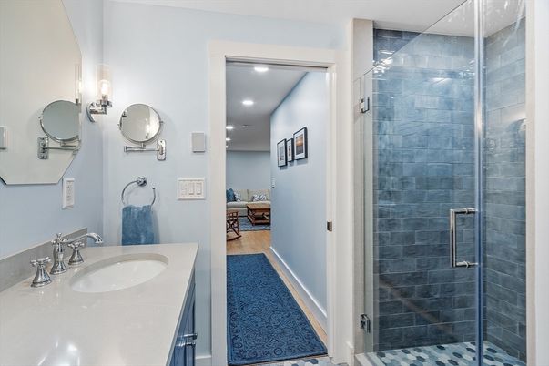 Bathroom, Dual Sink Vanities, Glass Shower, Interior, Recessed Lighting, Wood Texture Flooring
