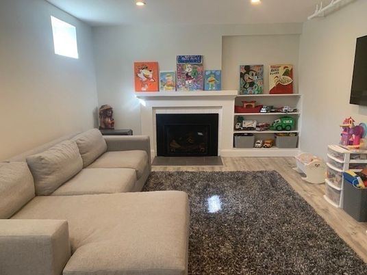 Fireplace, Interior, Living room, Recessed Lighting, Wood Texture Flooring
