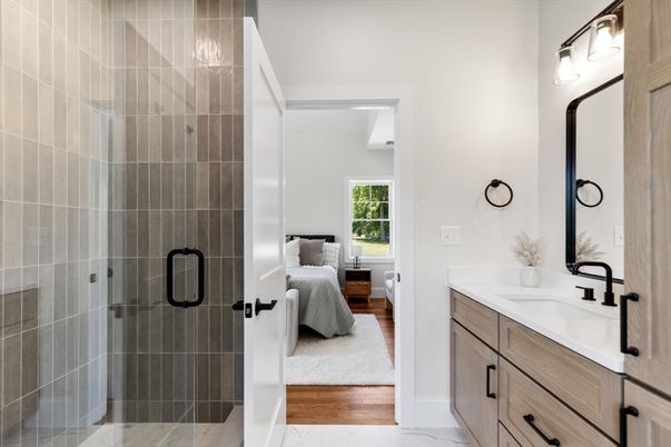 Bathroom, Bedroom, Dual Sink Vanities, Glass Shower, Interior, Marble, Wood Texture Flooring