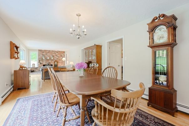 Chandelier, Dining room, Fireplace, Interior, Living room, Stone Walls, Wood Texture Flooring