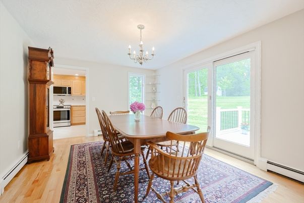 Chandelier, Dining room, Interior, Kitchen, Stainless Steel Appliances, Wood Texture Flooring