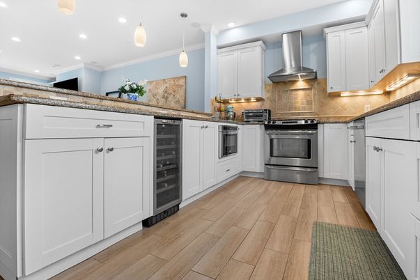 Interior, Kitchen, Pendant Lights, Recessed Lighting, Stainless Steel Appliances, Wood Texture Flooring