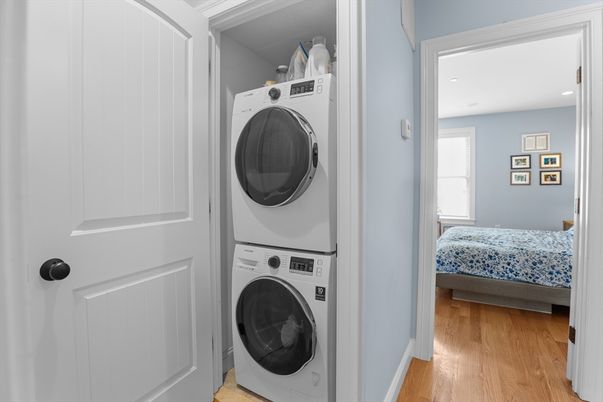Bedroom, Interior, Recessed Lighting, Utility Closets, Washer, Wood Texture Flooring