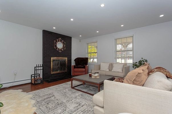 Fireplace, Interior, Living room, Recessed Lighting, Wood Texture Flooring