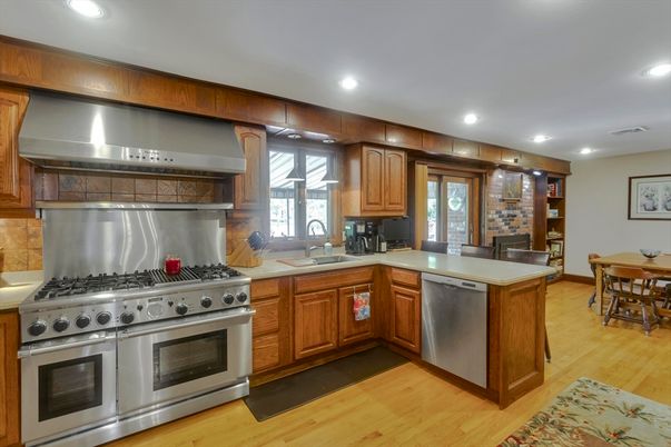 Dining room, Interior, Kitchen, Recessed Lighting, Stainless Steel Appliances, Wood Texture Flooring