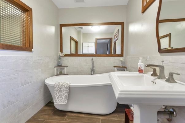 Bathroom, Dual Sink Vanities, Free Standing Baths, Interior, Wood Texture Flooring