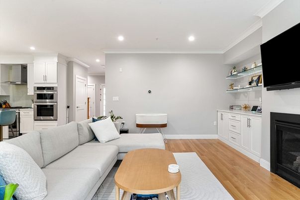 Fireplace, Interior, Kitchen, Living room, Recessed Lighting, Stainless Steel Appliances, Wood Texture Flooring