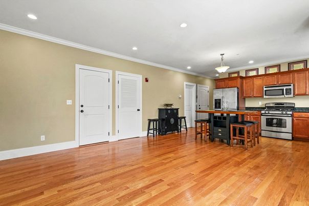 Interior, Kitchen, Pendant Lights, Recessed Lighting, Stainless Steel Appliances, Wood Texture Flooring