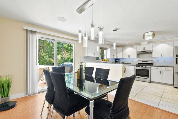 Dining room, Interior, Kitchen, Pendant Lights, Recessed Lighting, Stainless Steel Appliances, Wood Texture Flooring