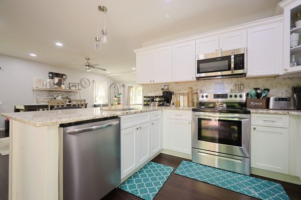 Dining room, Interior, Kitchen, Pendant Lights, Recessed Lighting, Stainless Steel Appliances, Wood Texture Flooring