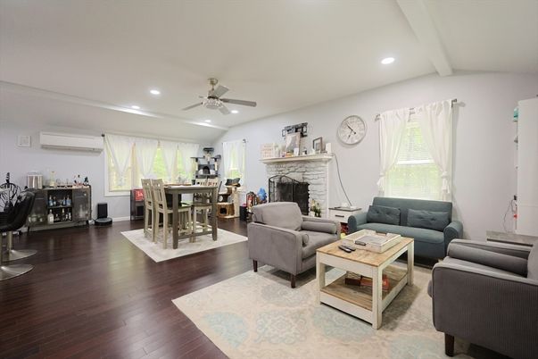 Dining room, Fireplace, Interior, Living room, Recessed Lighting, Wood Texture Flooring