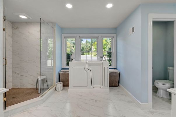 Bathroom, Dual Sink Vanities, Glass Shower, Interior, Marble, Marble Walls, Recessed Lighting