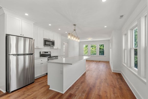 Chandelier, Interior, Kitchen, Pendant Lights, Recessed Lighting, Stainless Steel Appliances, Wood Texture Flooring