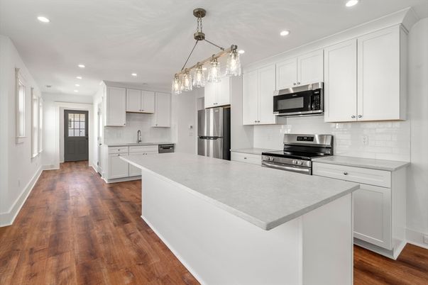 Interior, Kitchen, Pendant Lights, Recessed Lighting, Stainless Steel Appliances, Wood Texture Flooring