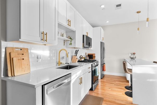 Interior, Kitchen, Pendant Lights, Recessed Lighting, Stainless Steel Appliances, Wood Texture Flooring