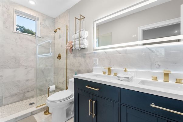 Bathroom, Dual Sink Vanities, Glass Shower, Interior, Marble Walls, Recessed Lighting