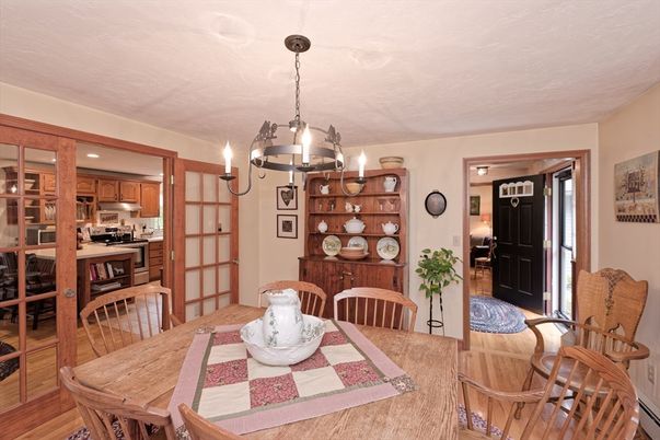 Chandelier, Dining room, Interior, Kitchen, Recessed Lighting, Stainless Steel Appliances, Wood Texture Flooring