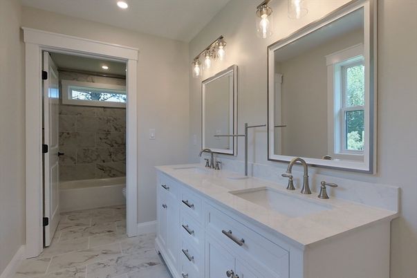 Bathroom, Dual Sink Vanities, Glass Shower, Interior, Marble, Marble Walls, Recessed Lighting